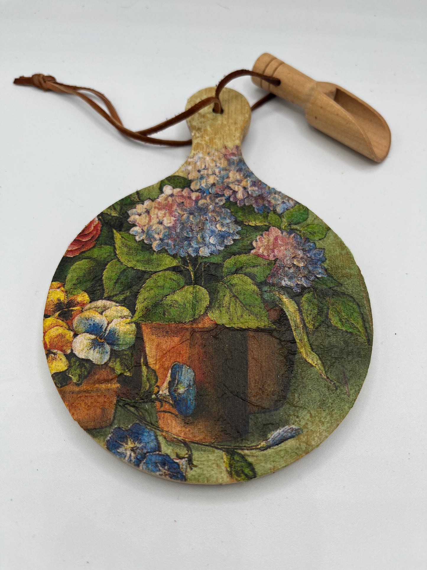 Hydrangeas in a bucket cutting board