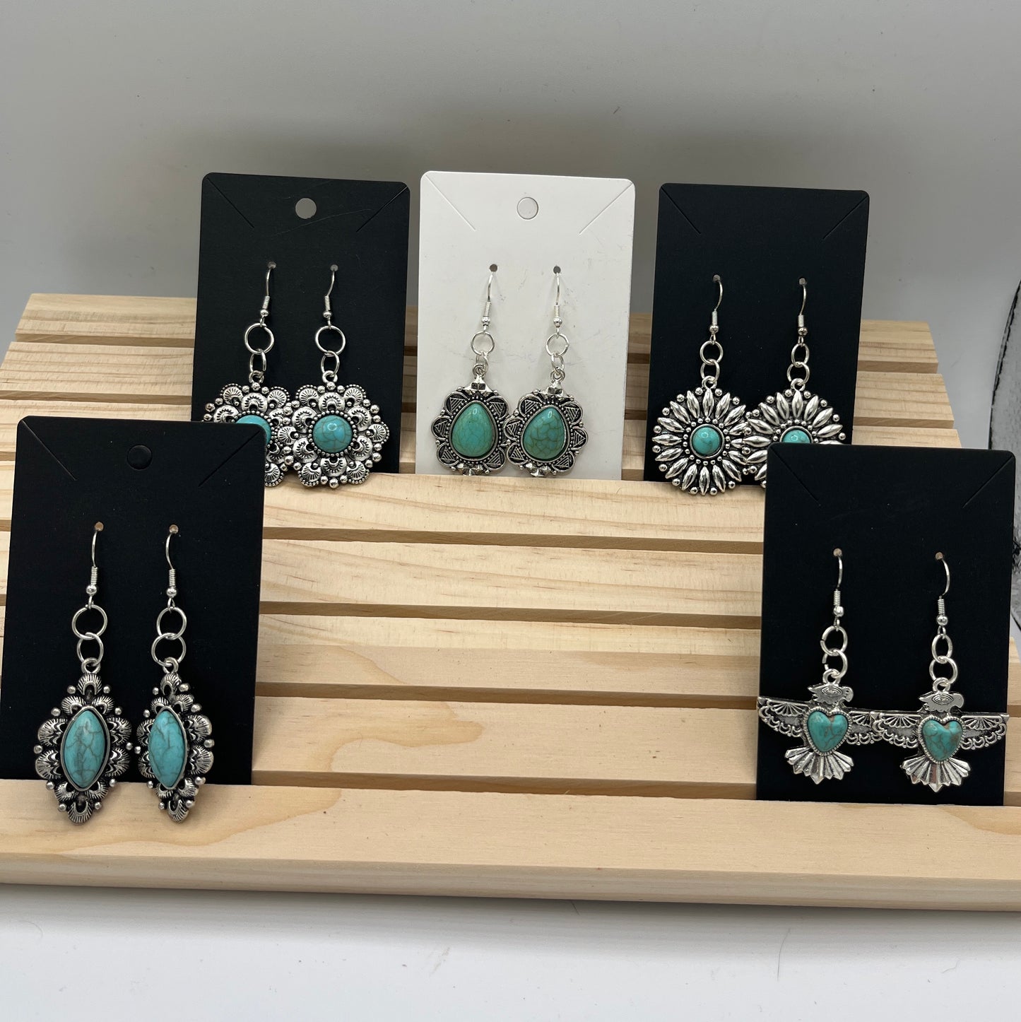 Silver tone and turquoise teardrop earring