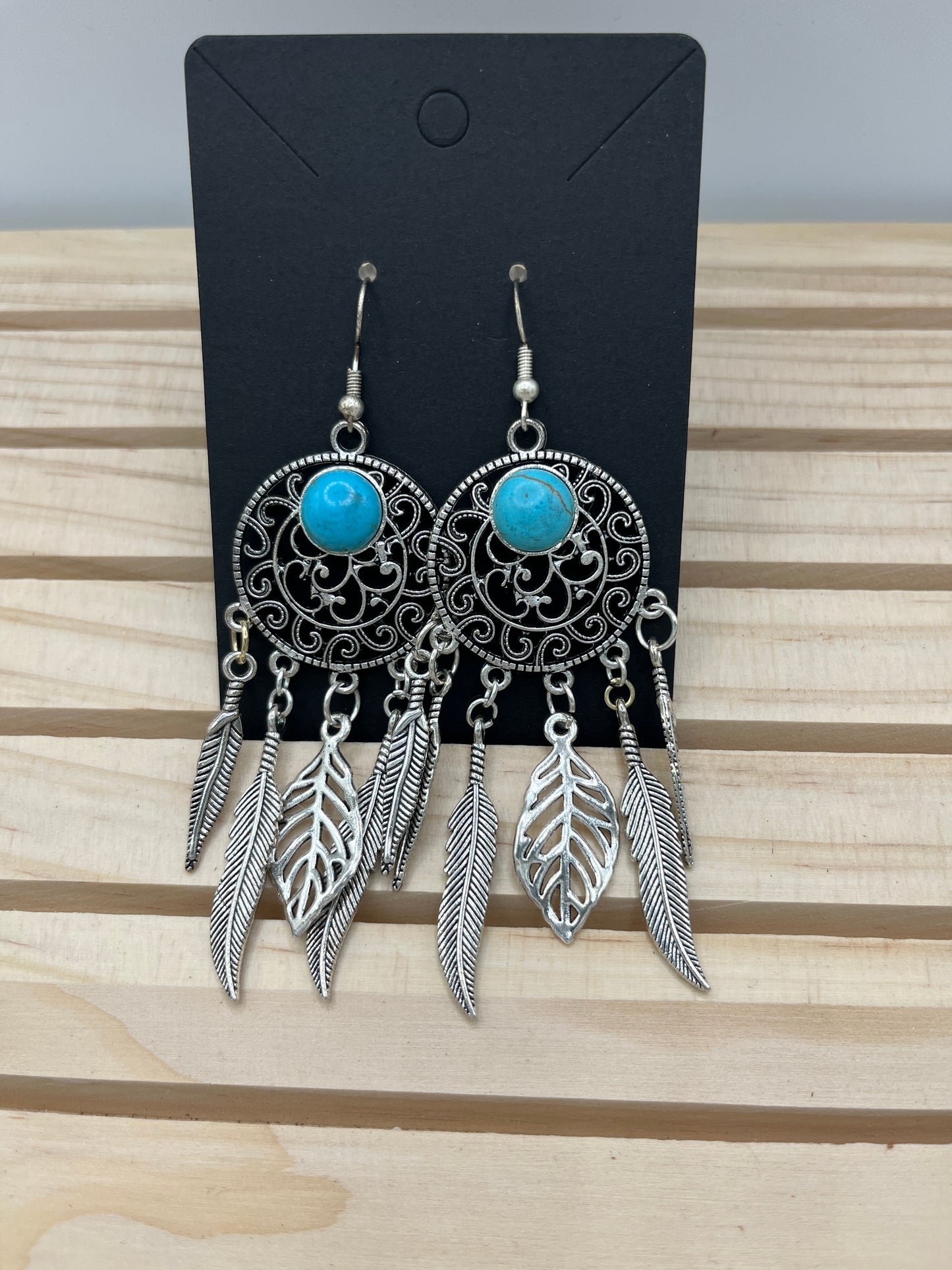 Dreamcatcher with metal feather earrings
