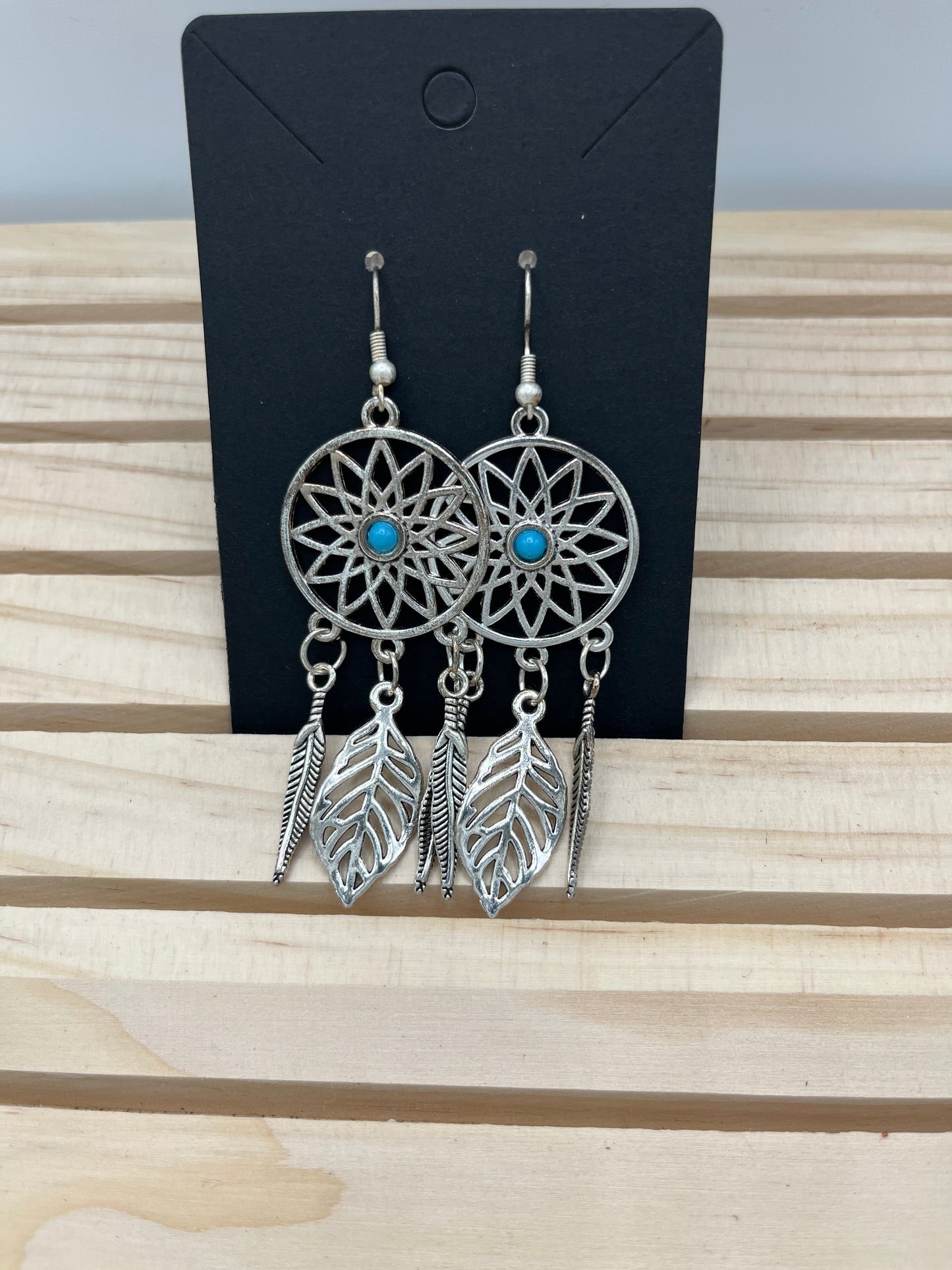 Dreamcatcher sunburst design with feathers earrings