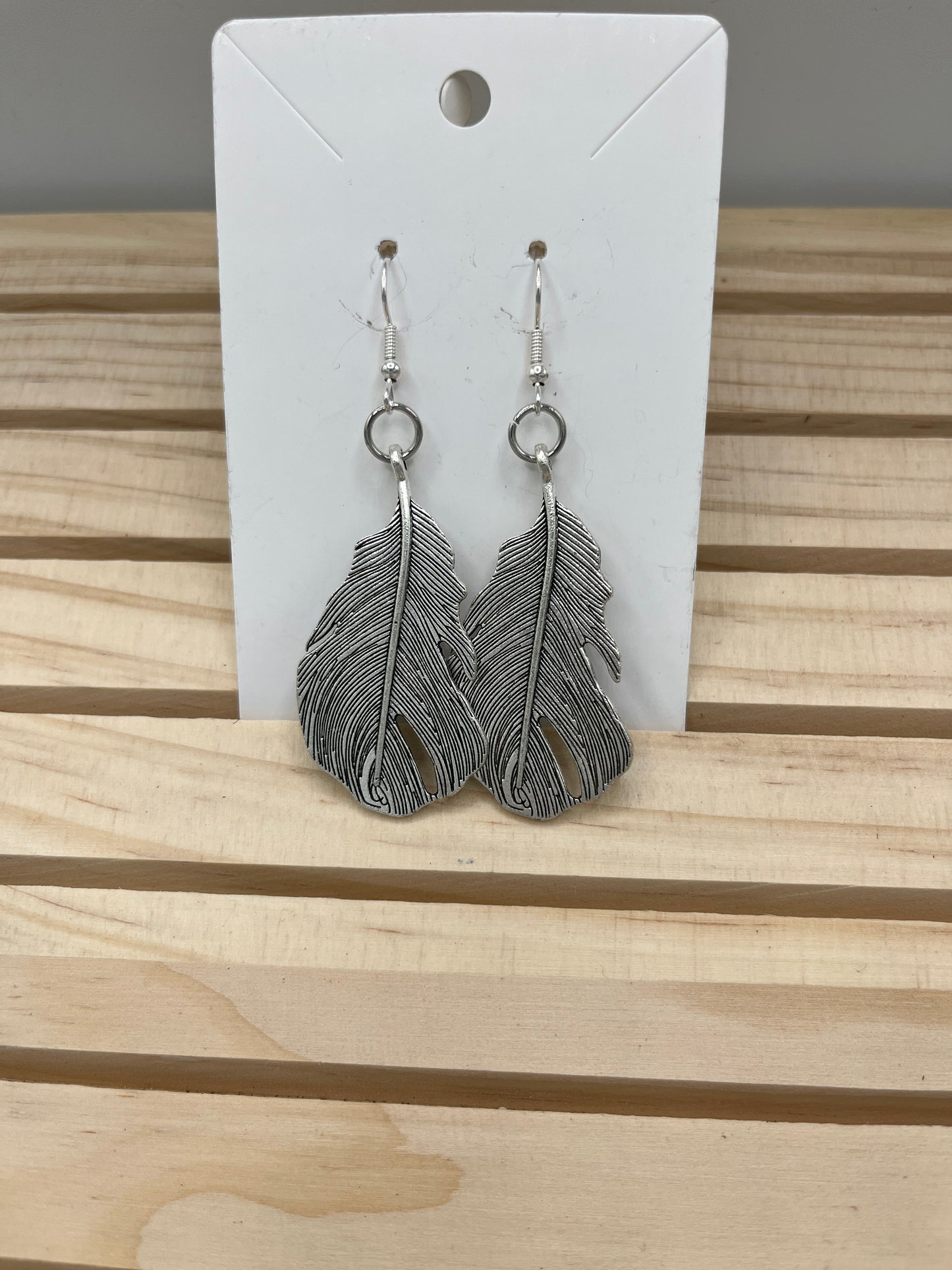 Wide Silver feather earrings