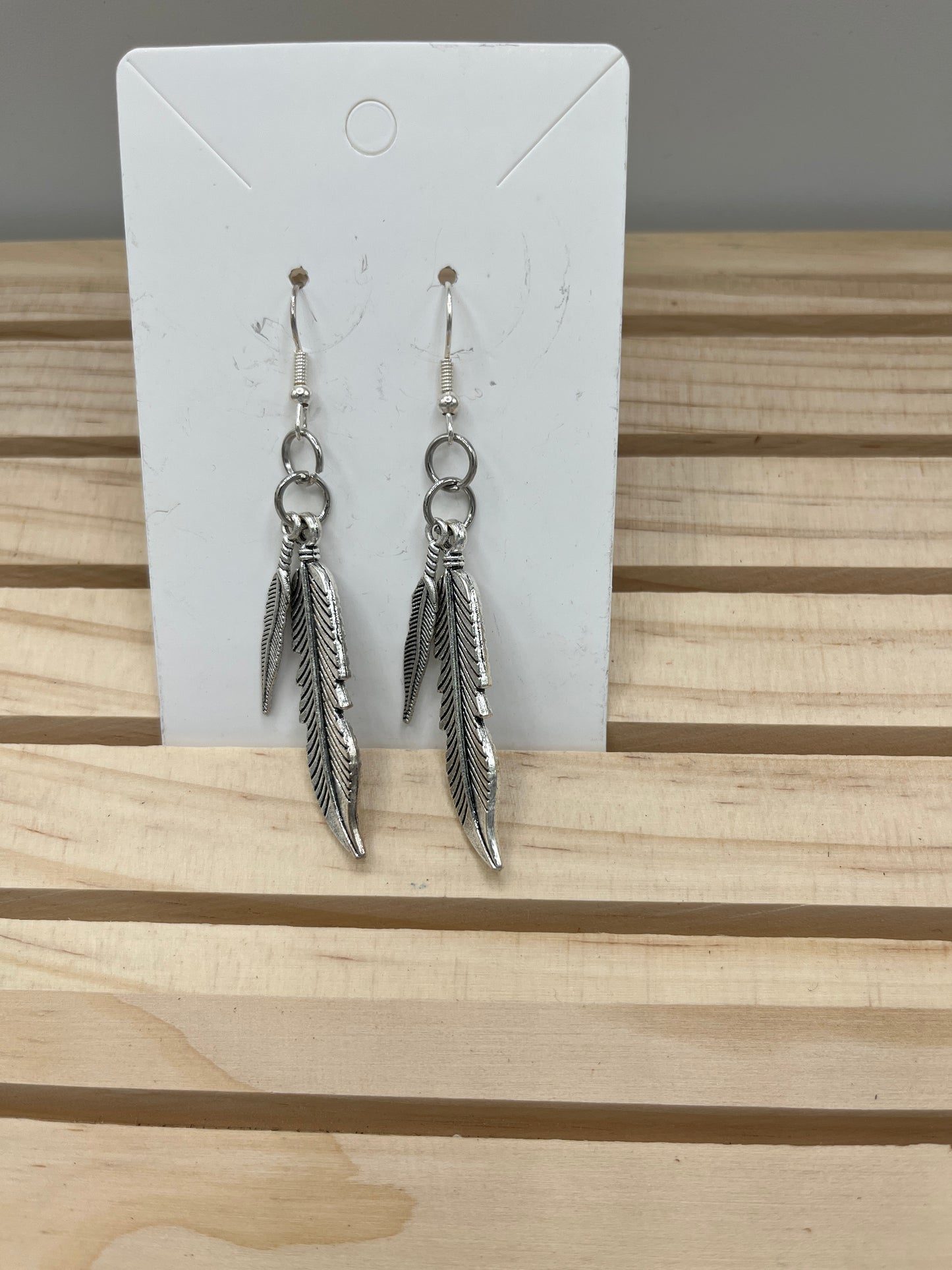 Silver plated double feather earrings