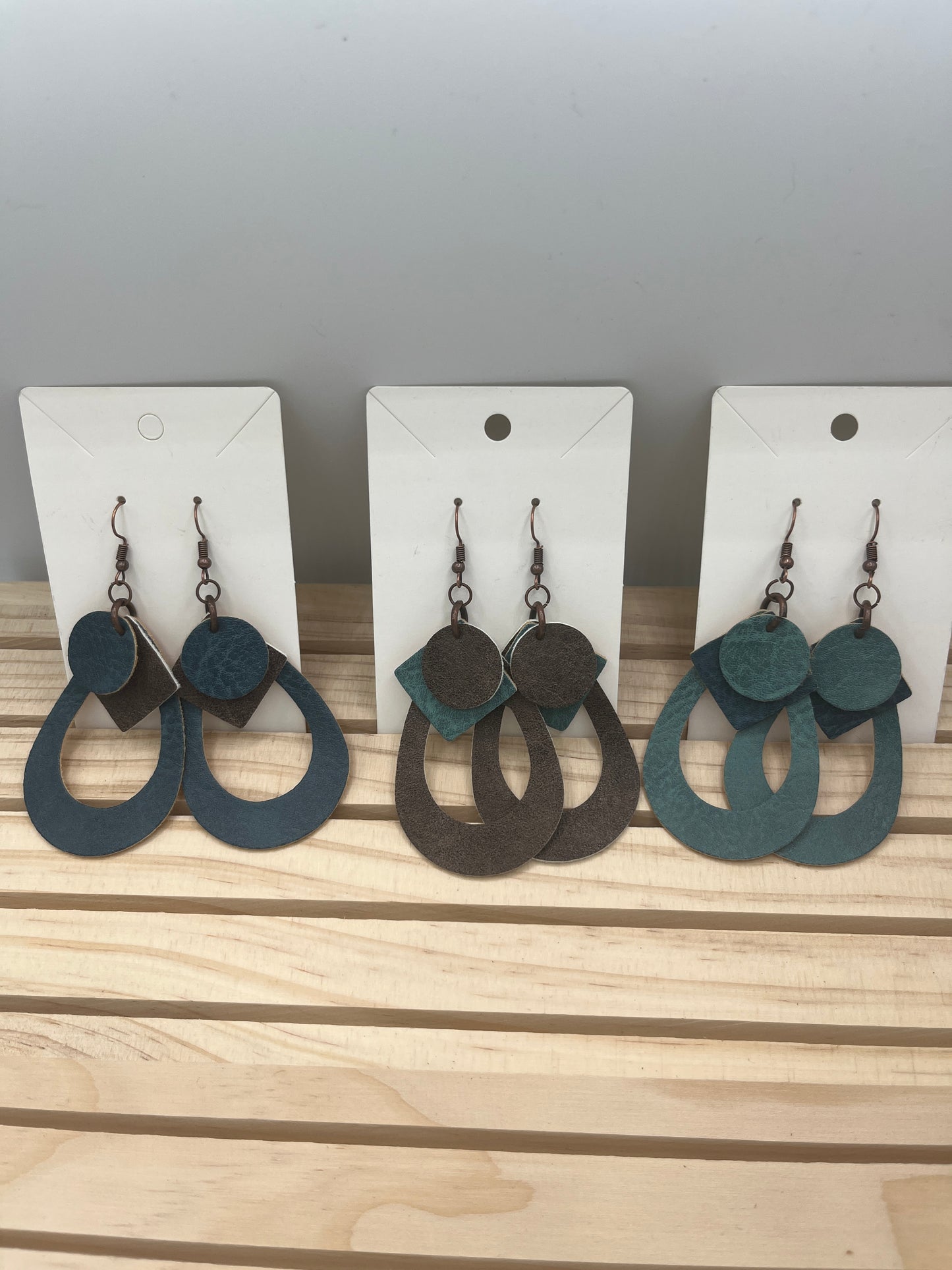 Leather lt green teardrop earrings