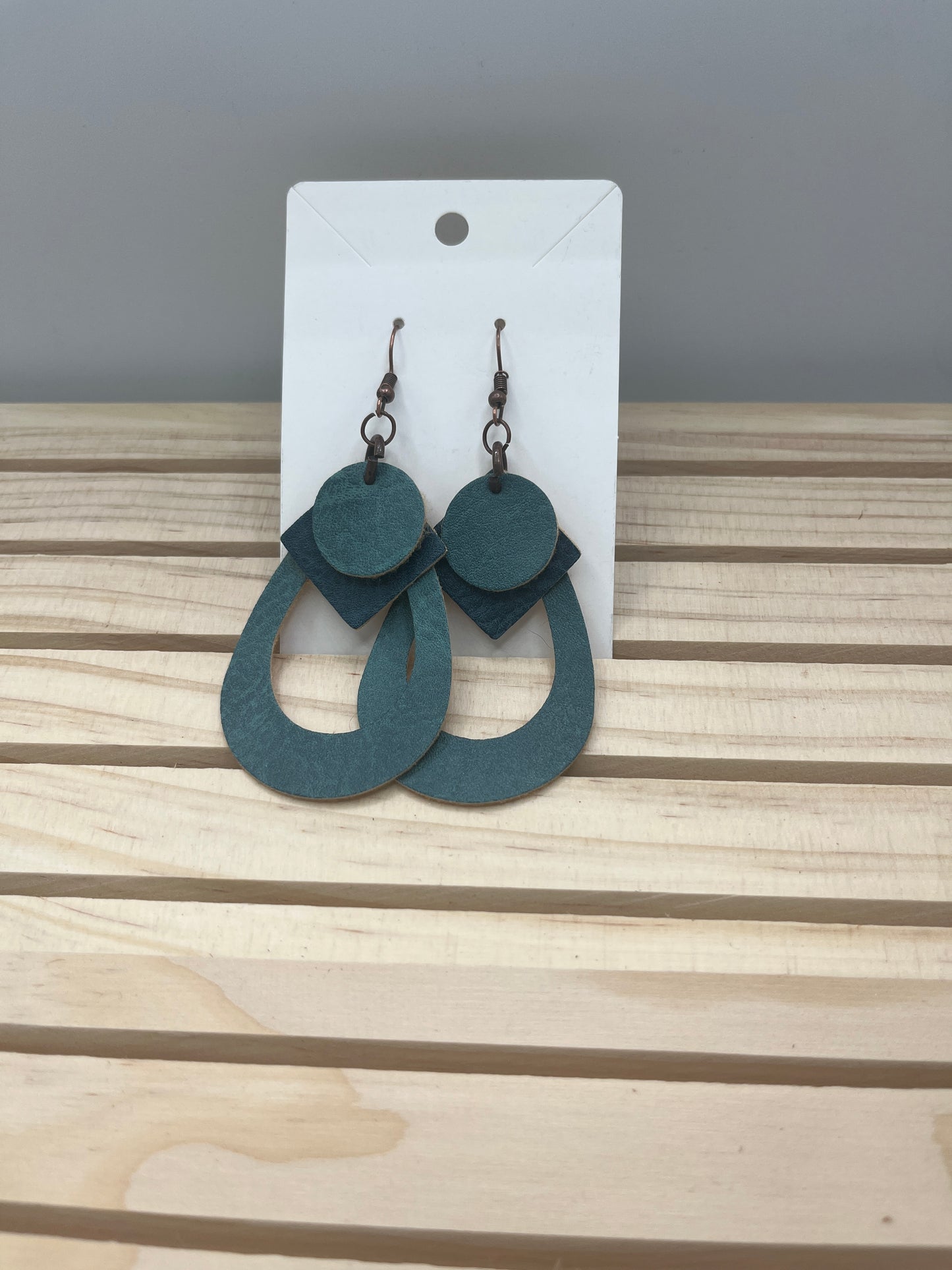 Leather lt green teardrop earrings