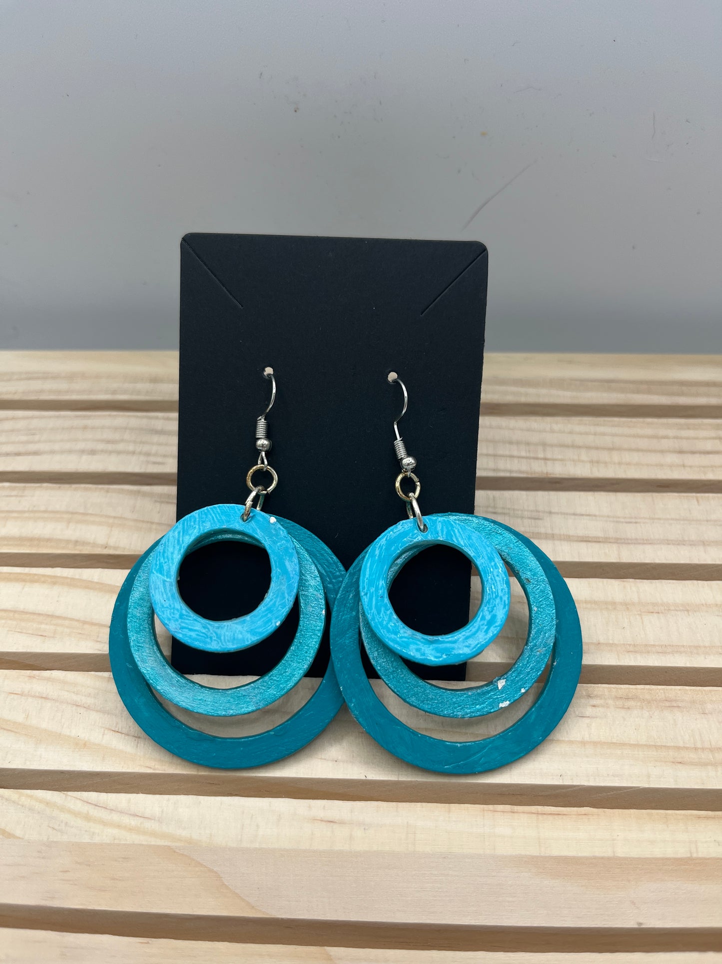 Three tiered teal circle earrings