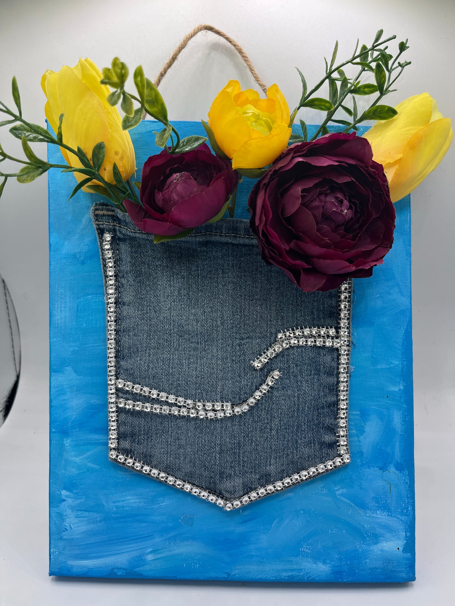 Denim pocket floral holder