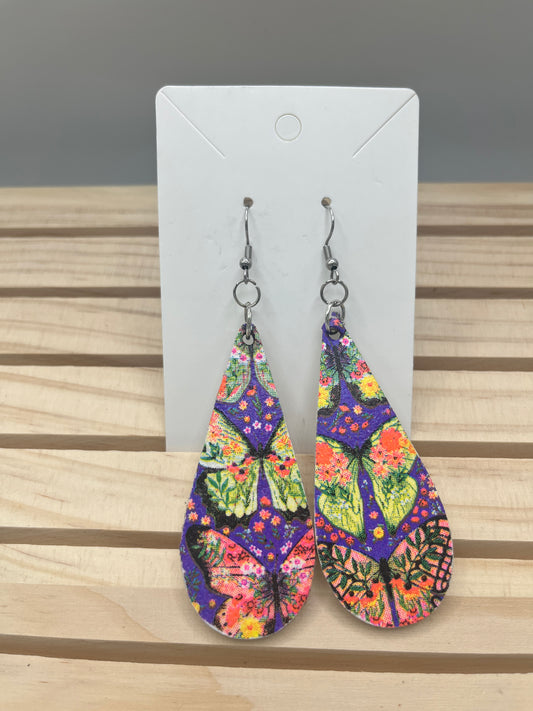 Butterfly earrings on slender teardrops