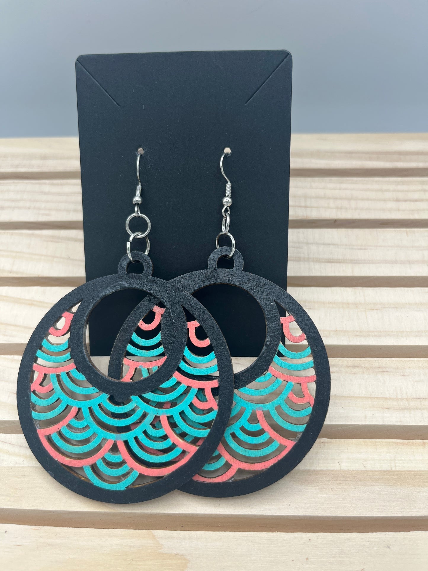 Teal/peach/black filigree round earrings