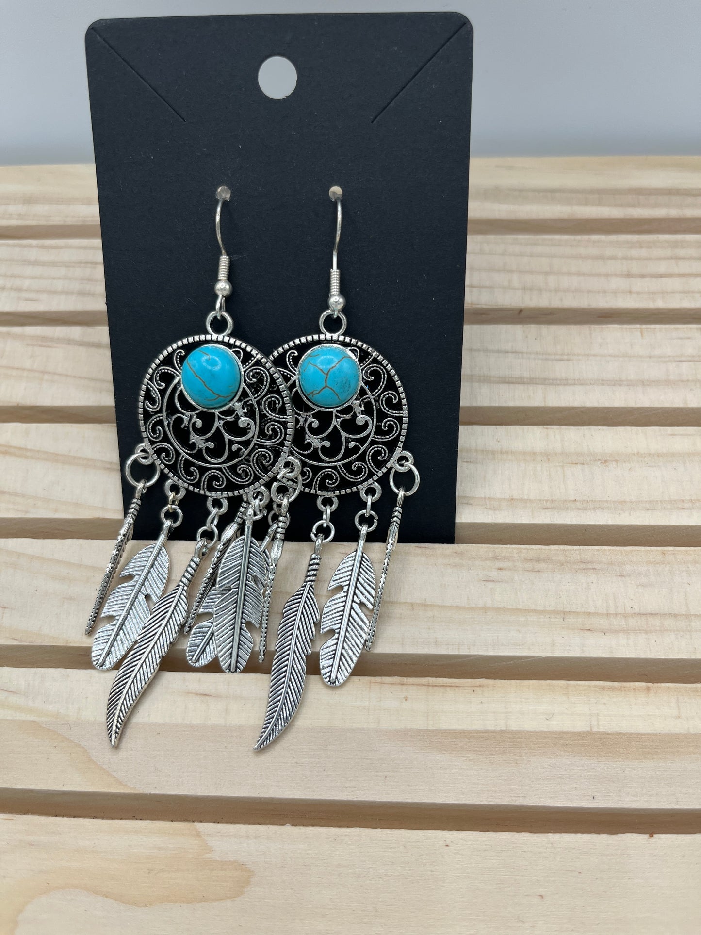 Dreamcatcher with slender metal feather earrings