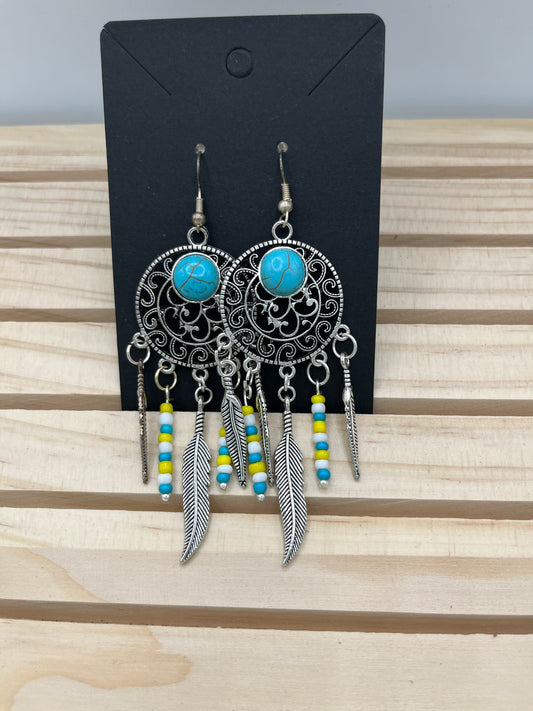 Dreamcatcher with turquoise, white and yellow beads earrings