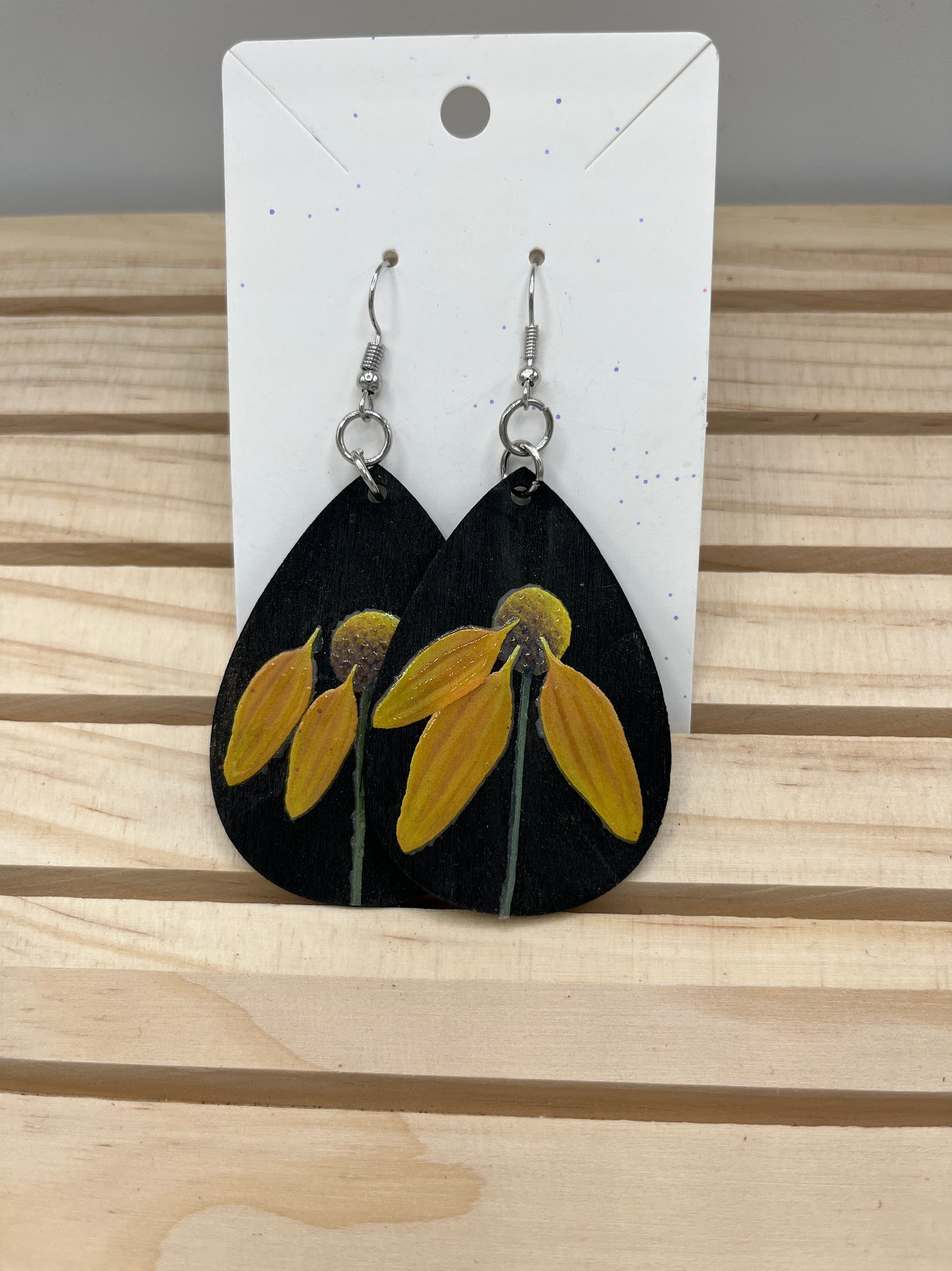 Black teardrop earrings with wilting sunflowers