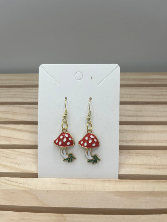 Red and white mushroom with leaves earrings